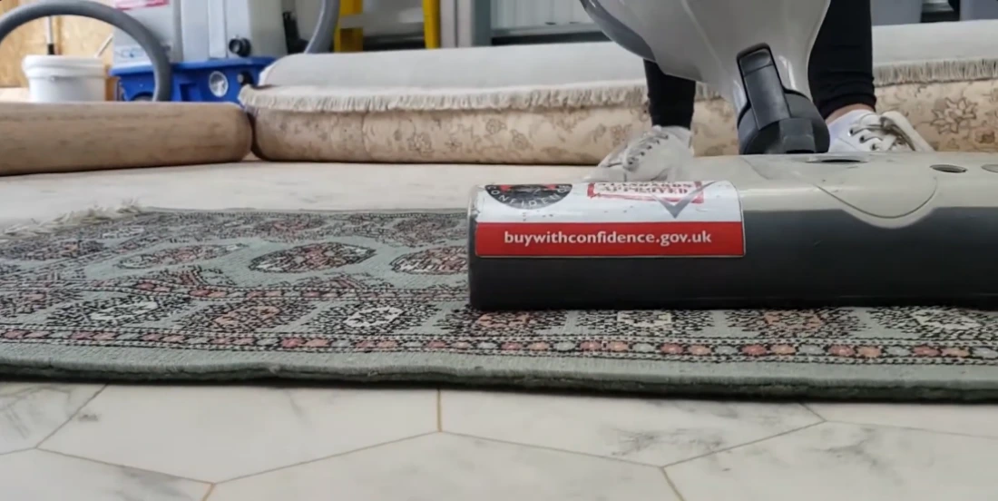 Wool rug being carefully maintained in a Medford Oregon home &mdash; when to use home care vs professional wool rug cleaning